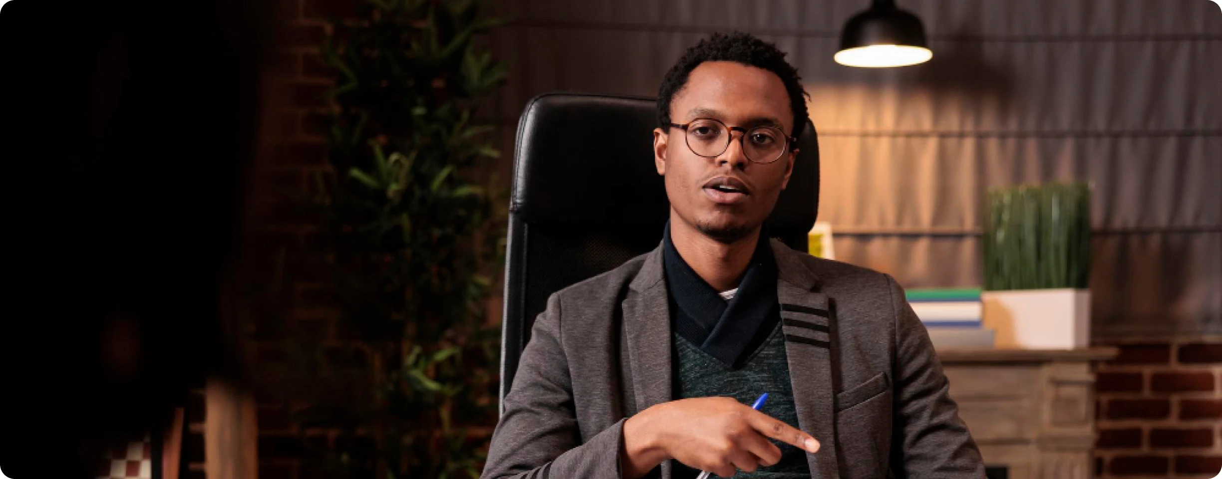 A human resources consultant speaking in a professional office